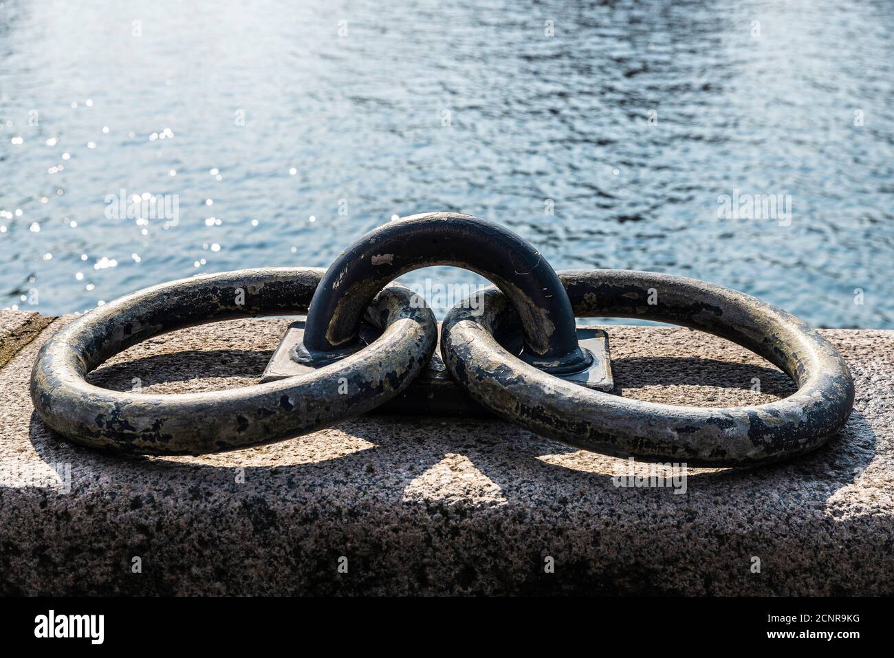 Old rusty metal moorage in the port of Copenhagen, Denmark as background Stock Photo