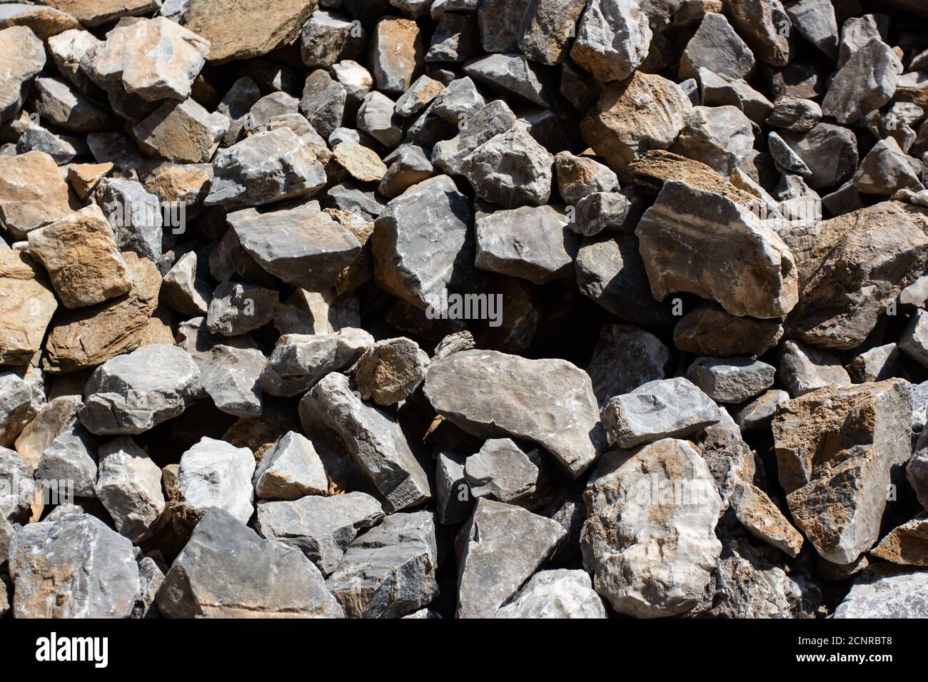 Gray large rock stones and debris background Stock Photo