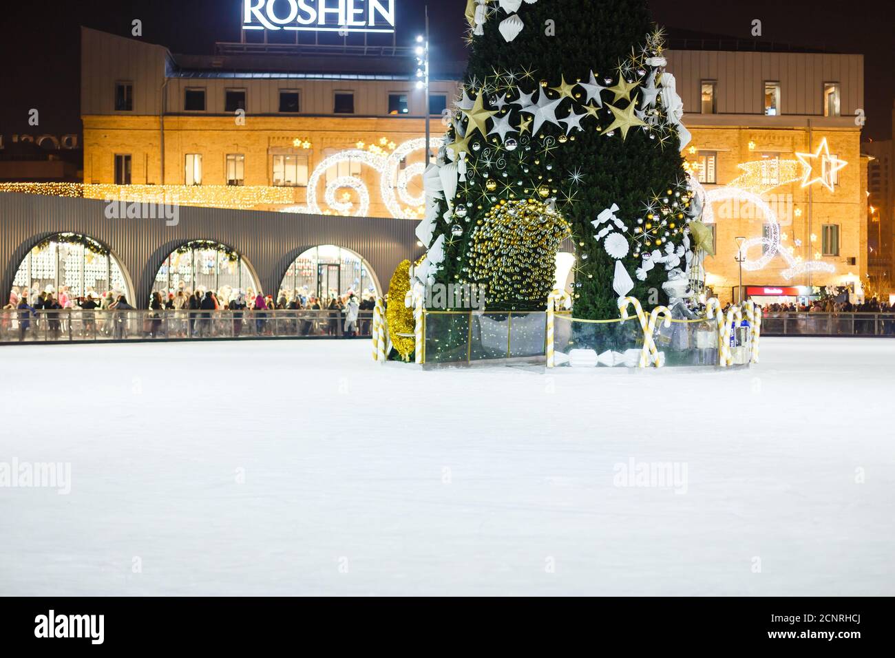 Winter Wonderland attraction ice rink christmas street, at nightfall