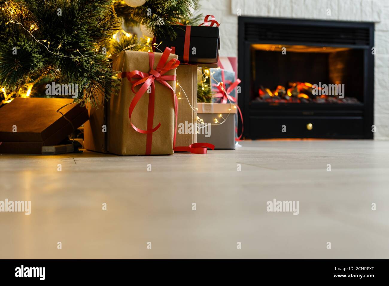 christmas tree with presents under Stock Photo - Alamy