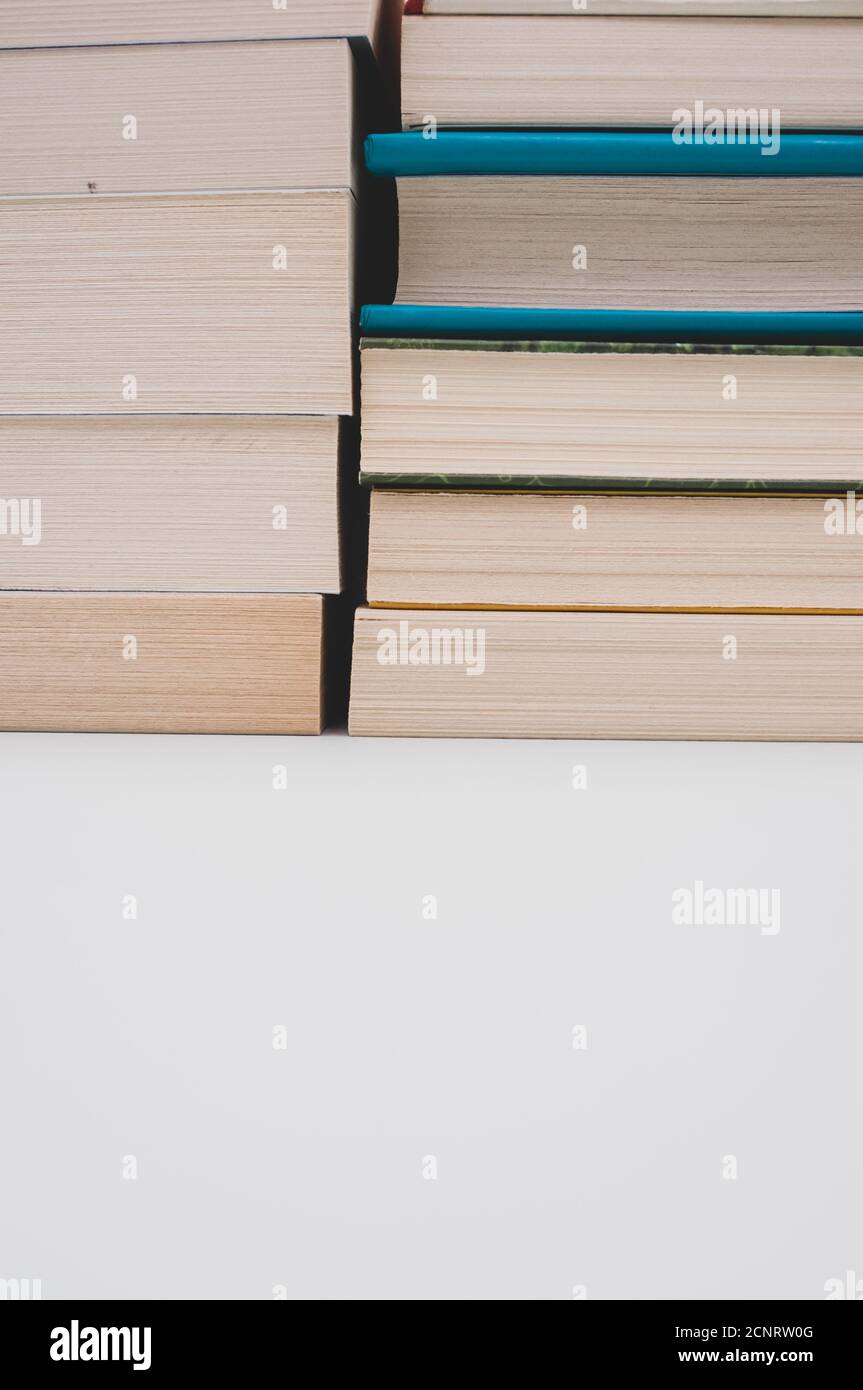 Books stack on top of each other Stock Photo Alamy