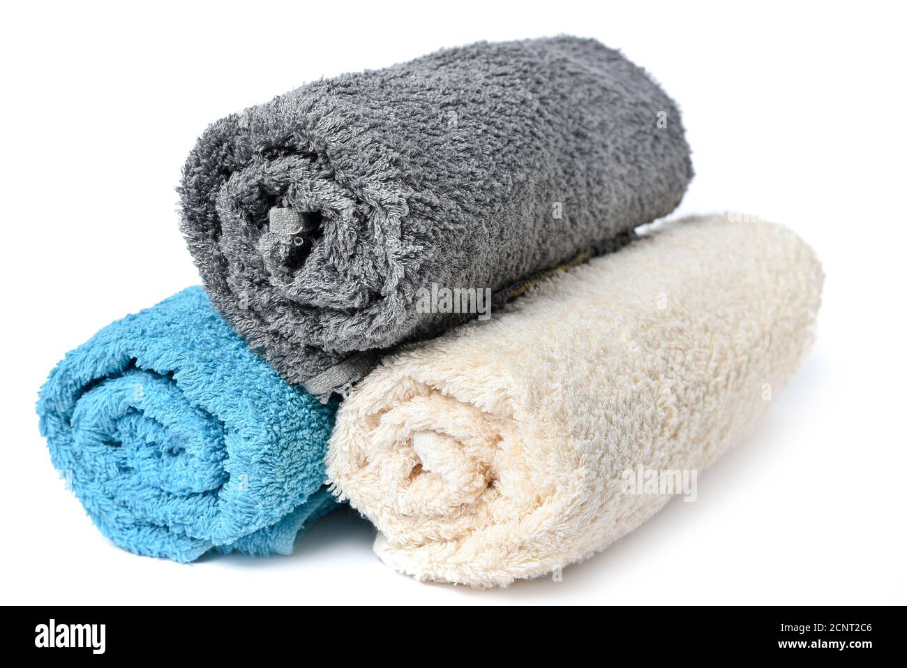 Stack of soft clean multi-colored spa towels on a white background Stock Photo