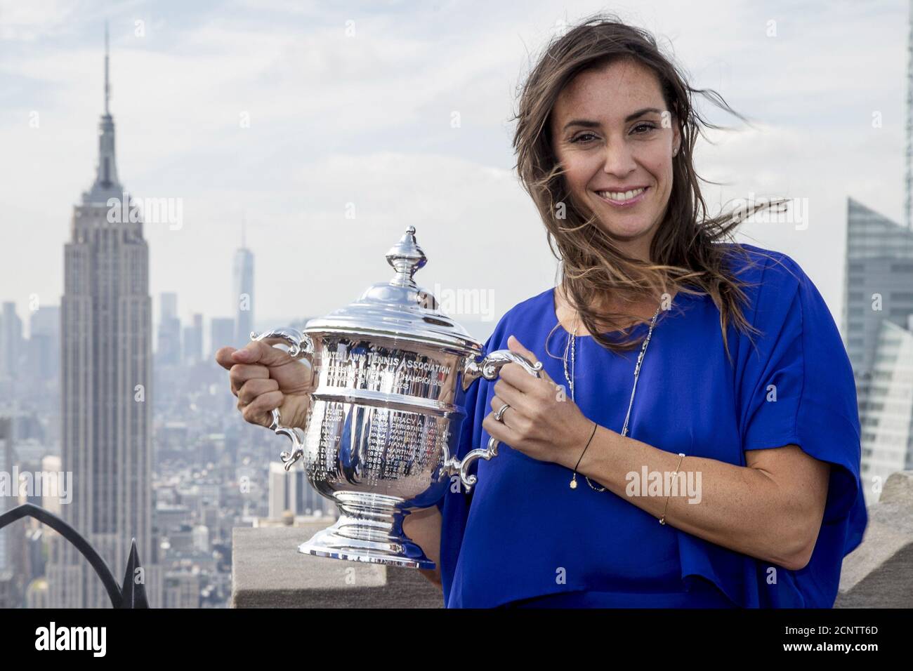 Flavia Pennetta of Italy poses with her Women's U.S. Open Tennis champion trophy at the Top of The Rock in New York, September 13, 2015. Pennetta won her first grand slam singles title over Roberta Vinci in an improbable all-Italian U.S. Open final on Saturday then added one more shock to a stunning fortnight by announcing her retirement. REUTERS/Brendan McDermid Stock Photo
