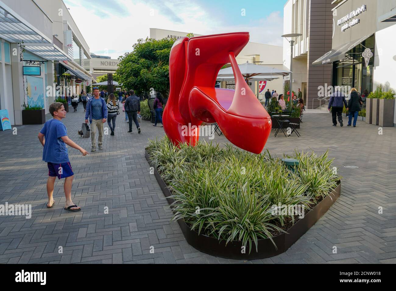 Outdoor Shopping Center with Upmarket Chain Retailers, a Movie