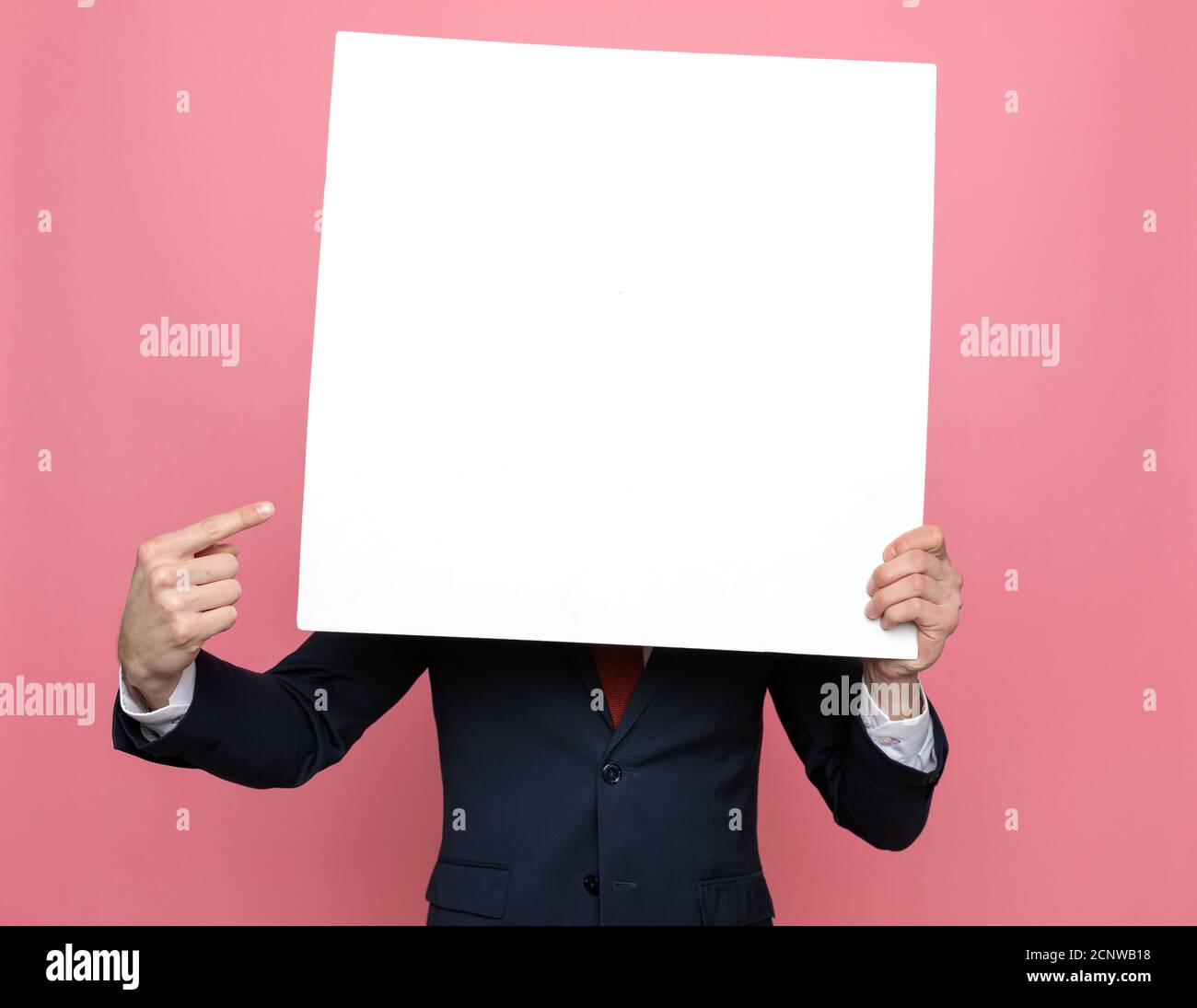 Hiding face behind fingers hires stock photography and images Alamy