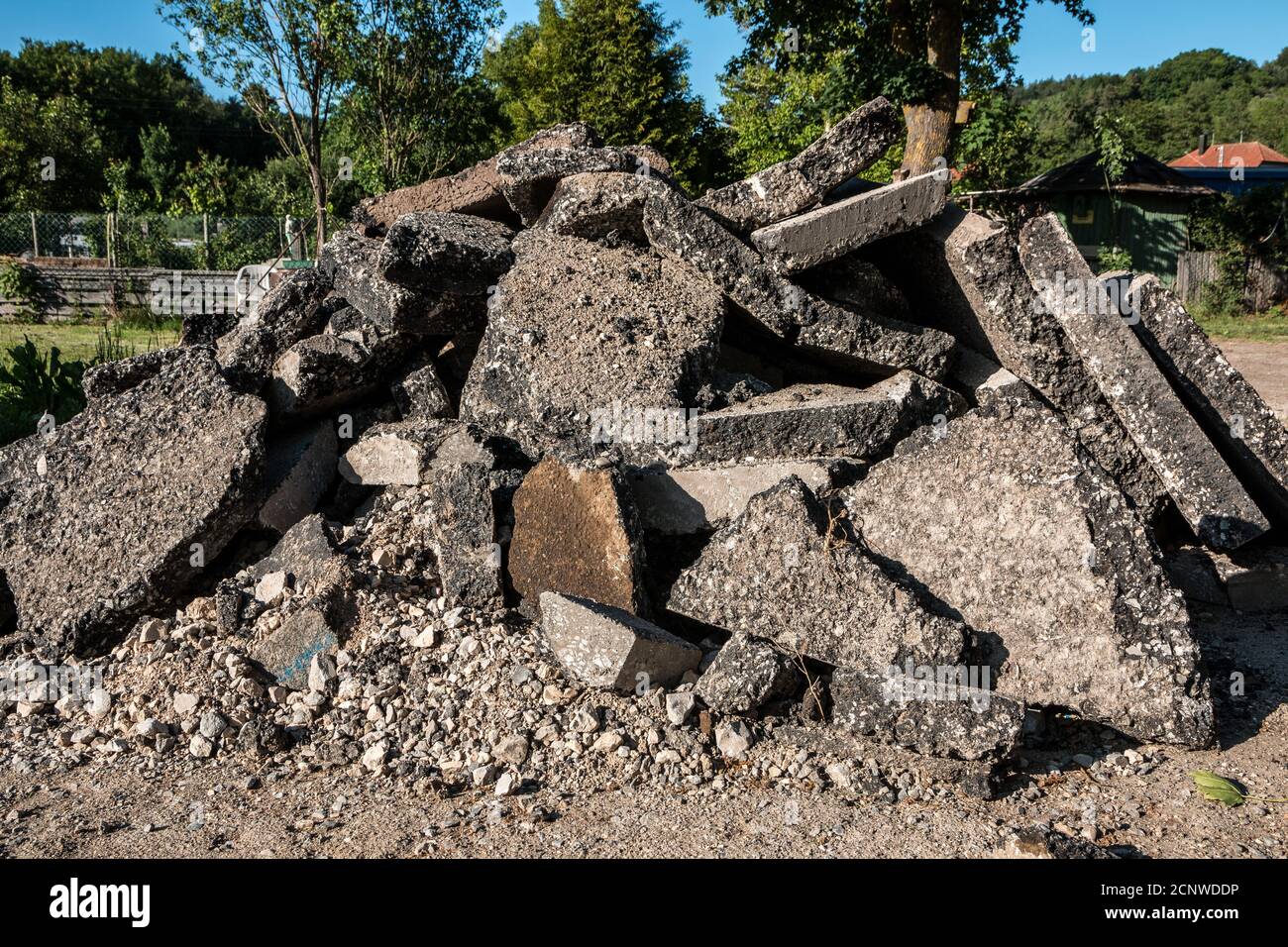 A bunch of building waste on the ground Stock Photo