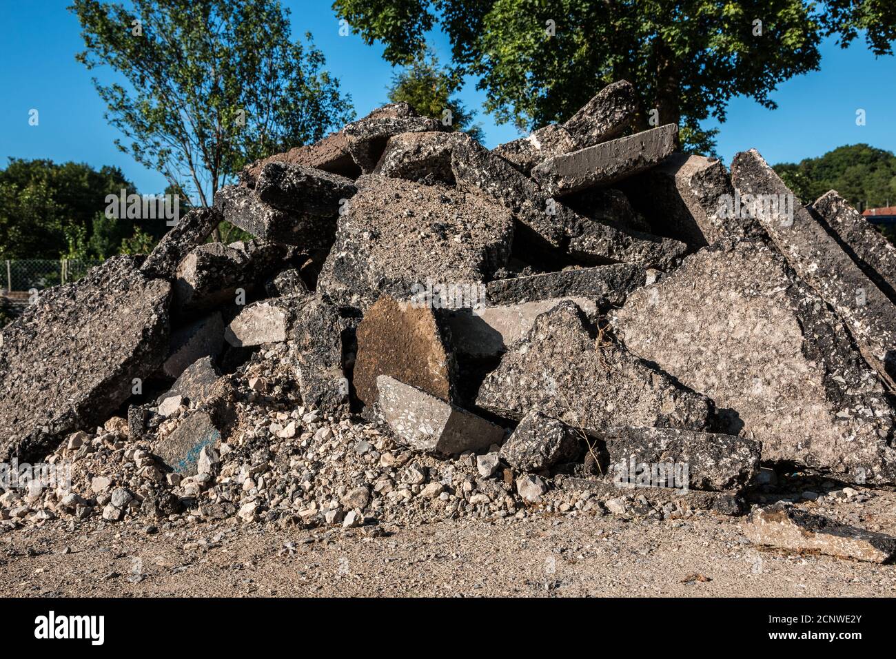 A bunch of building waste on the ground Stock Photo