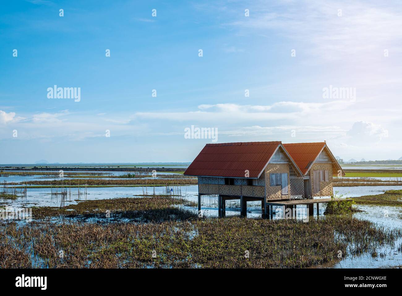 Abandoned house in the middle of the lake, is a landmark, is an important tourist attraction, of Phatthalung province, which has a nice atmosphere, an Stock Photo