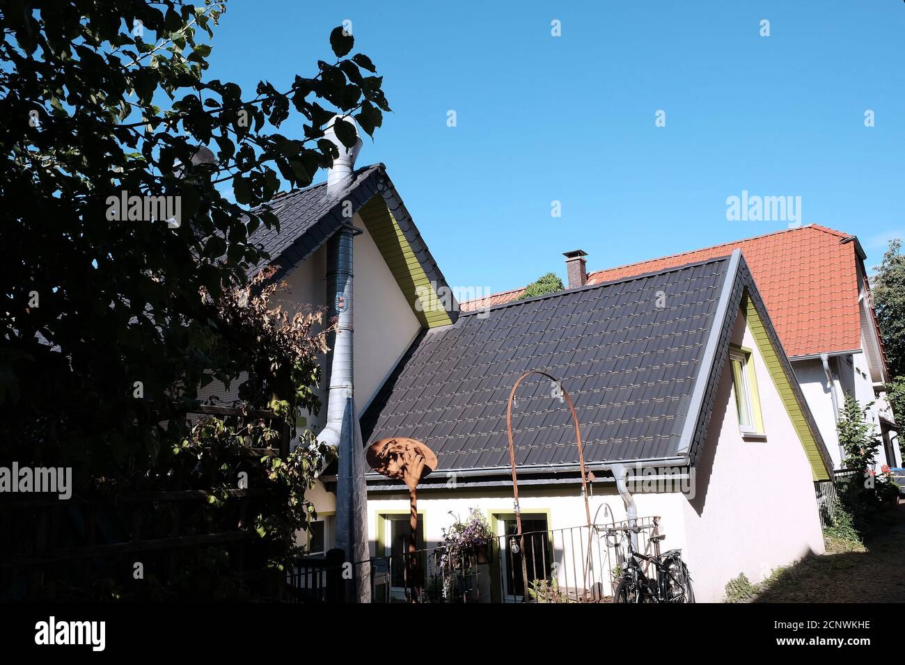Facade of a modern house under blue sky in Oerlinghausen Stock Photo ...