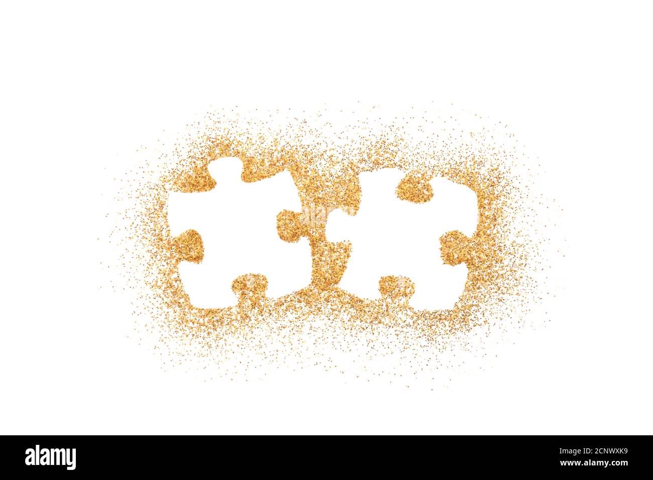 Pair of two matching puzzle pieces on golden glitter isolated on white background Stock Photo