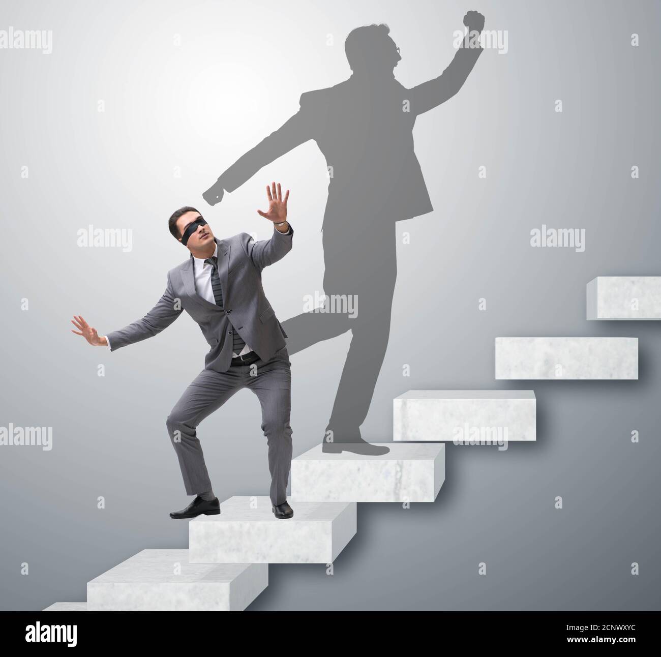 The businessman and his shadow in business concept Stock Photo - Alamy