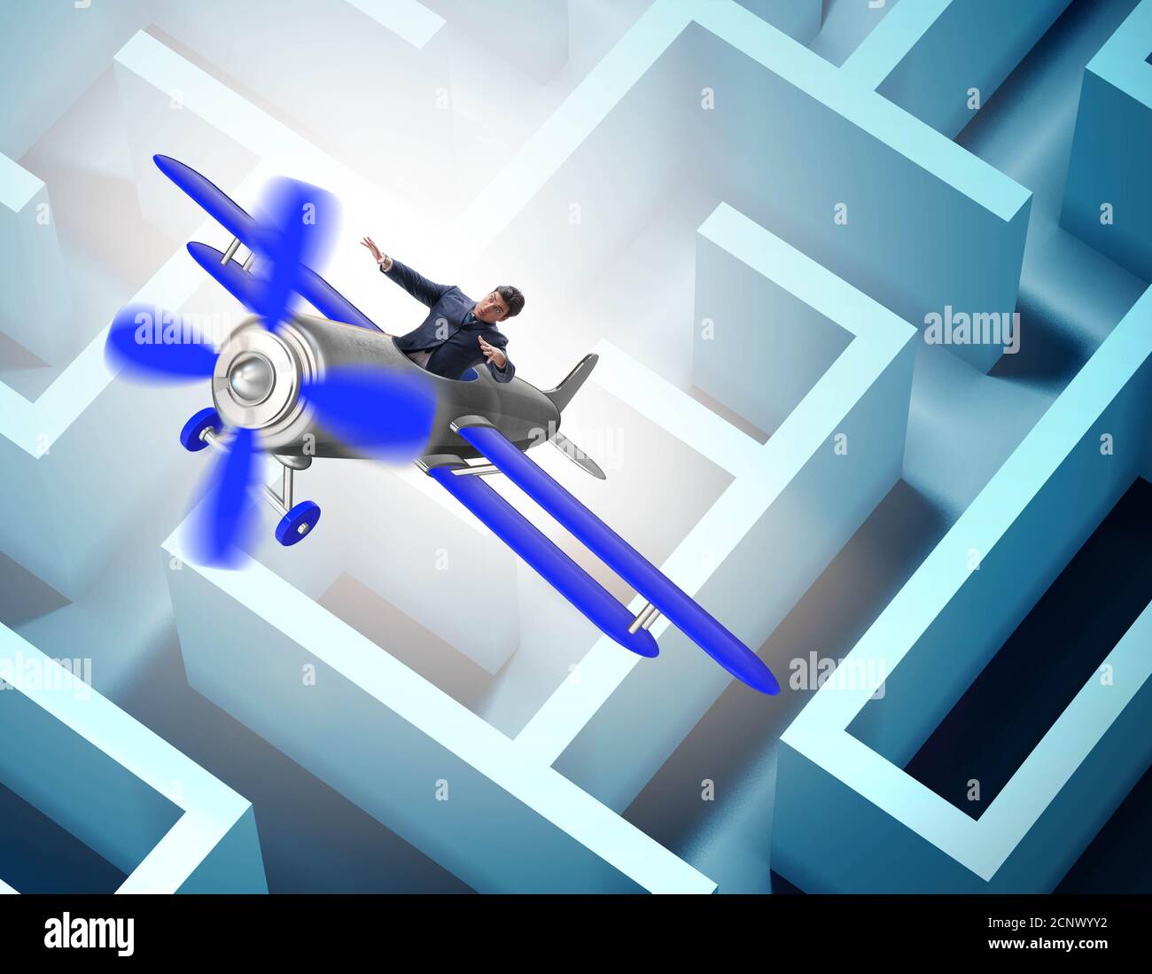 The businessman escaping from maze on airplane Stock Photo Alamy