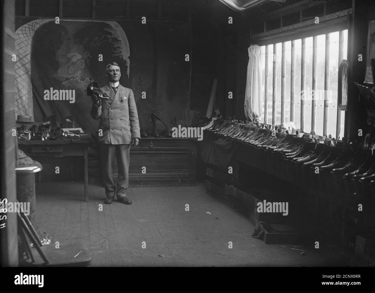 Shoe Salesman In Hotel Sample Room Bowden Alberta Stock Photo Alamy
