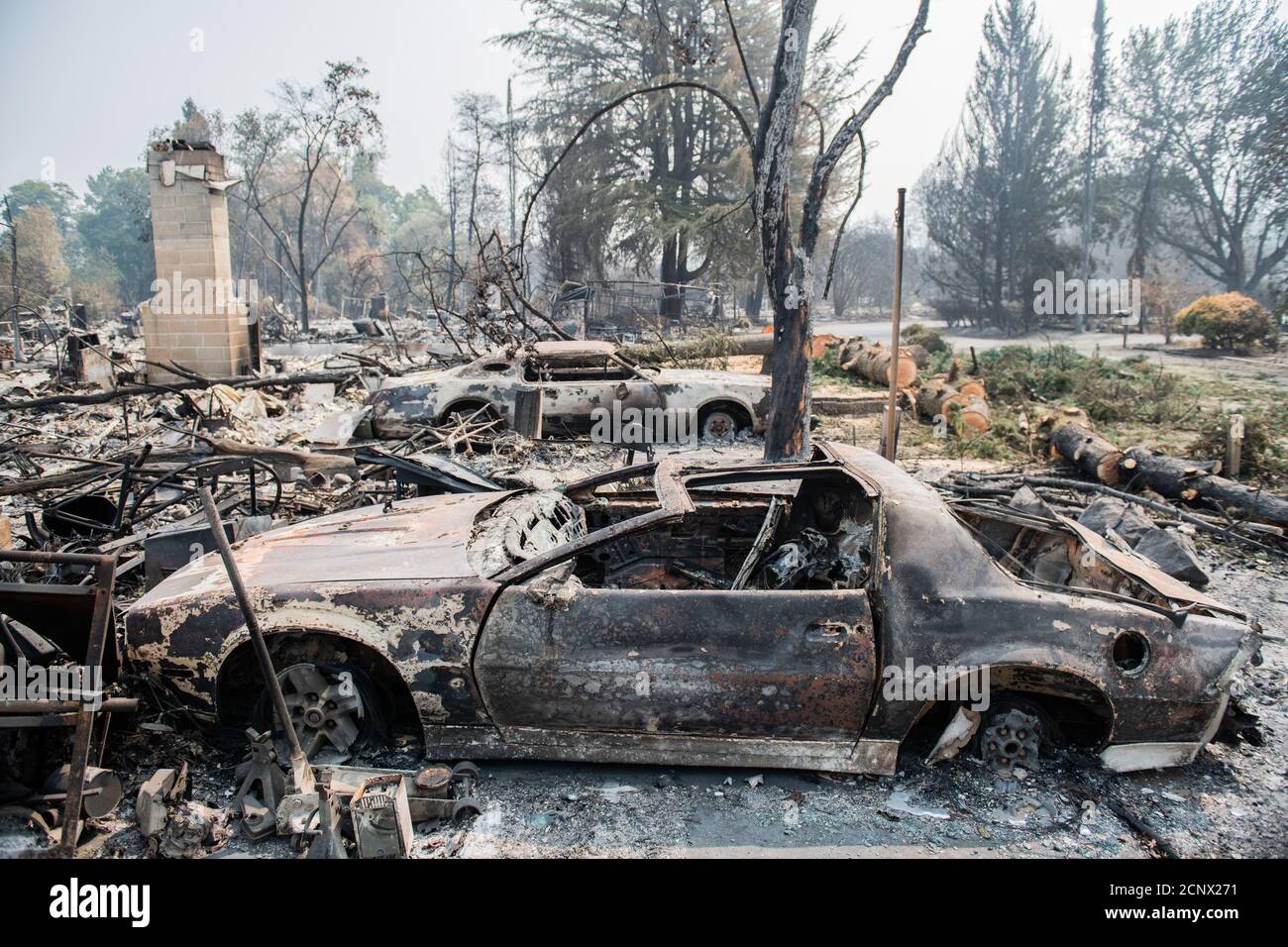 TALENT, ORE - SEPTEMBER 18, 2020: A general view of burned out vehicles amid the aftermath of the Almeda Fire. The town of Talent, Oregon, showing the burned out homes, cars and rubble left behind. In Talent, about 20 miles north of the California border, homes were charred beyond recognition. Across the western US, at least 87 wildfires are burning, according to the National Interagency Fire Center. They've torched more than 4.7 million acres -- more than six times the area of Rhode Island. Credit: Chris Tuite/imageSPACE Stock Photo