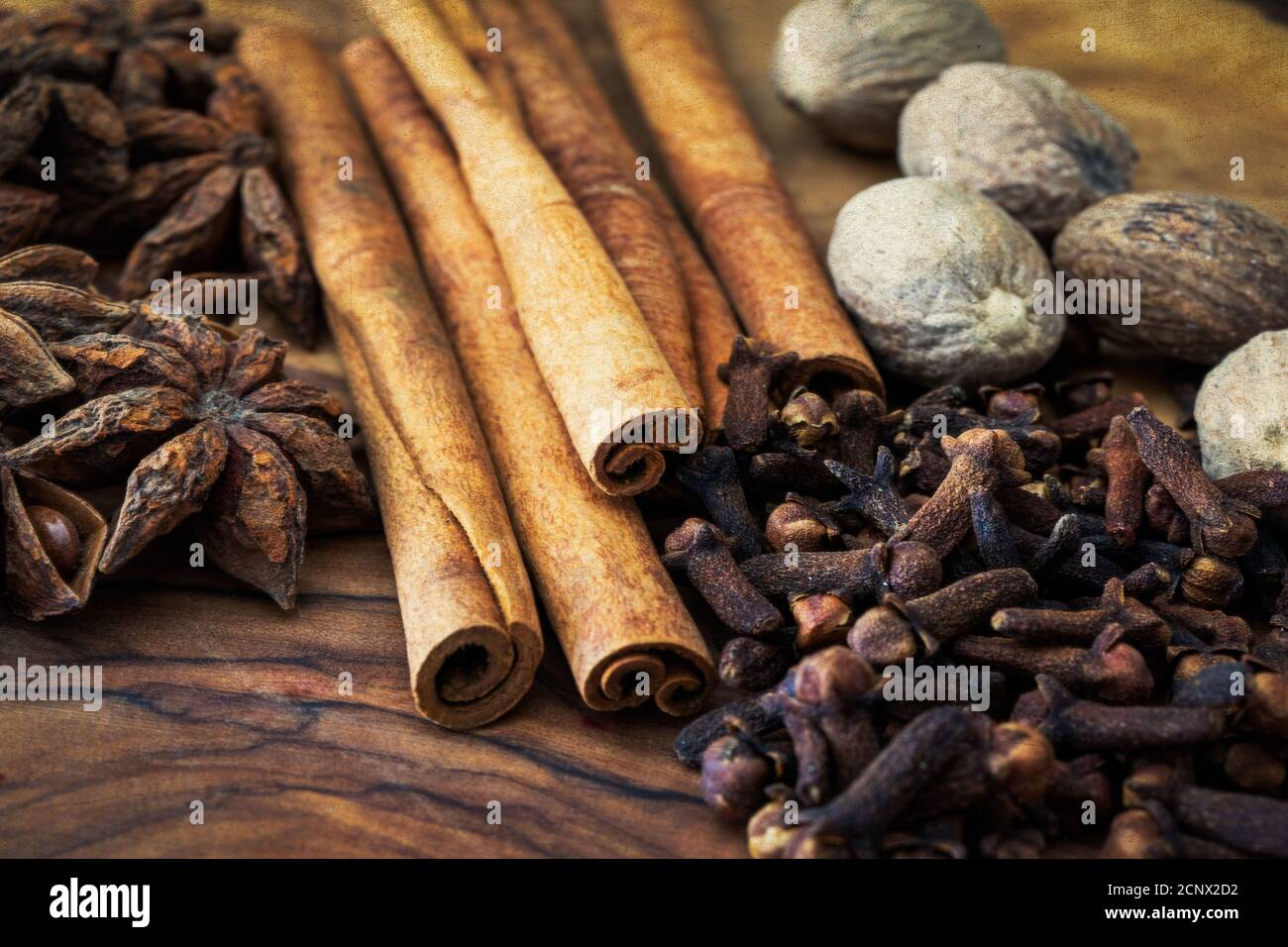 whole spices, aromatic nutmeg, cinnamon sticks, cloves, star anise