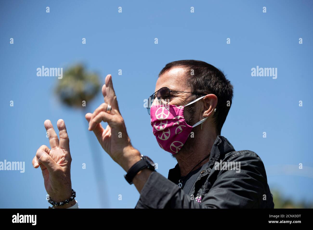 Musician Ringo Starr Wears A Face Mask As He Poses To Celebrate His 80th Birthday During The Outbreak Of The Coronavirus Disease Covid 19 In Beverly Hills California U S July 7 2020 Reuters Mario