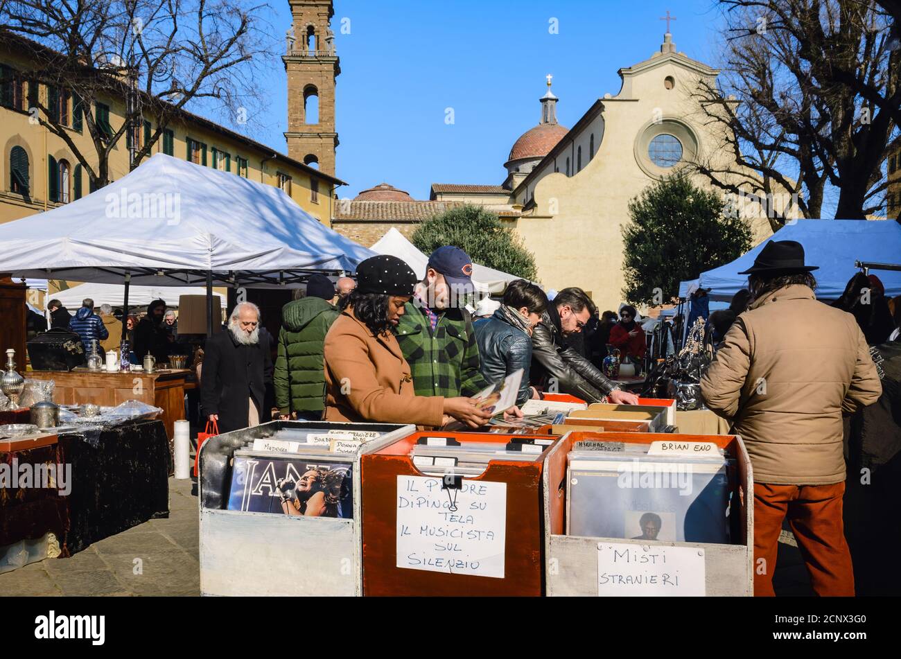 Florence, Italy - February 11, 2018: Traditional flea market in Santo Spirito square in Florence, Italy, on february 11, 2018, with second hand vintag Stock Photo