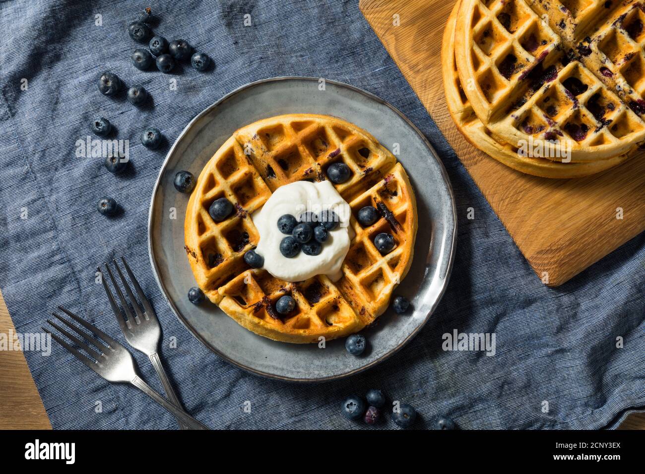 Homemade Warm Blueberry Belgian Waffles with Whipped Cream Stock Photo Alamy