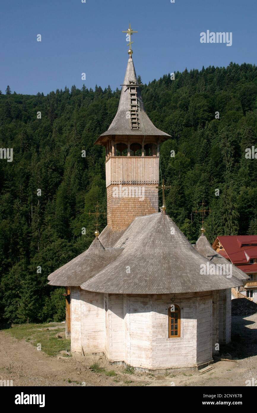 Neamt County, Romania, 2008. The building of Paltin Monastery, in the traditional architectural style of churches in Maramures. Stock Photo