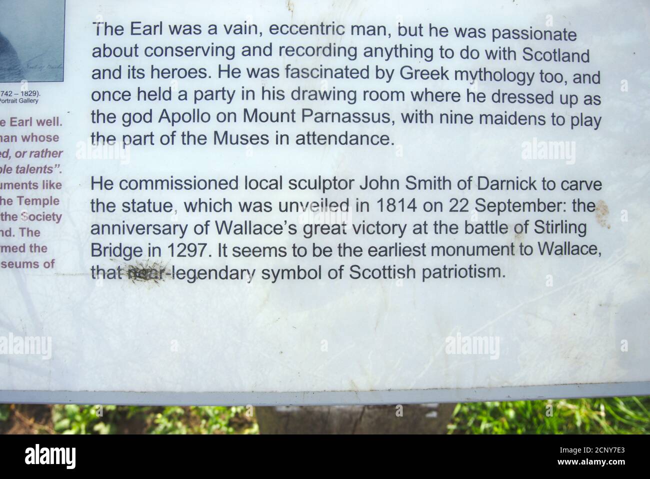 Information board describing the William Wallace statue at Bemersyde, partly defaced by a Wallace supporter. Stock Photo