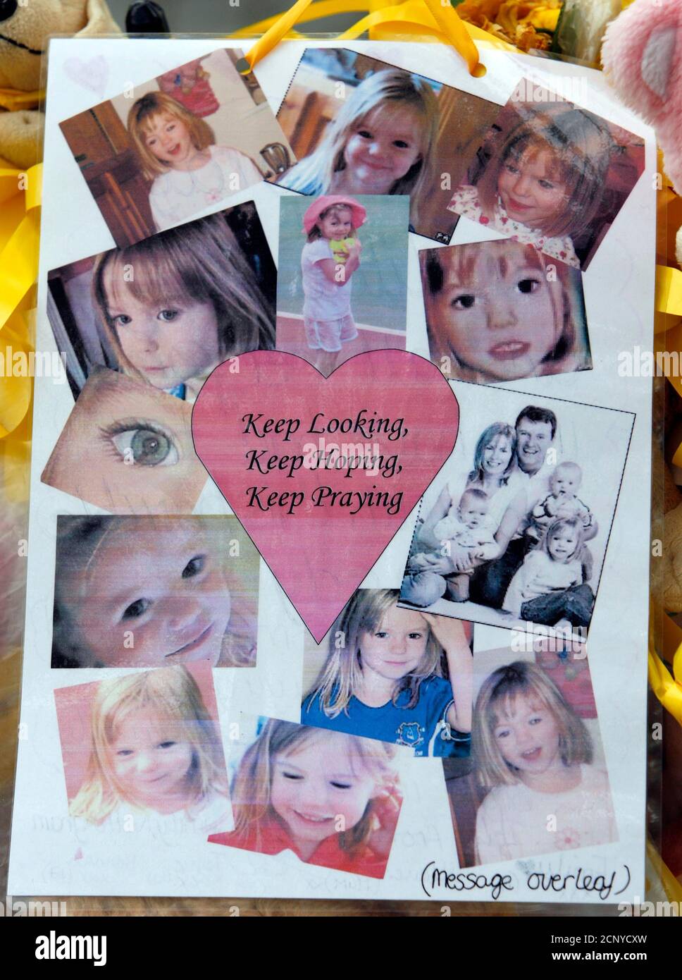 A message for missing British girl Madeleine McCann is seen near her