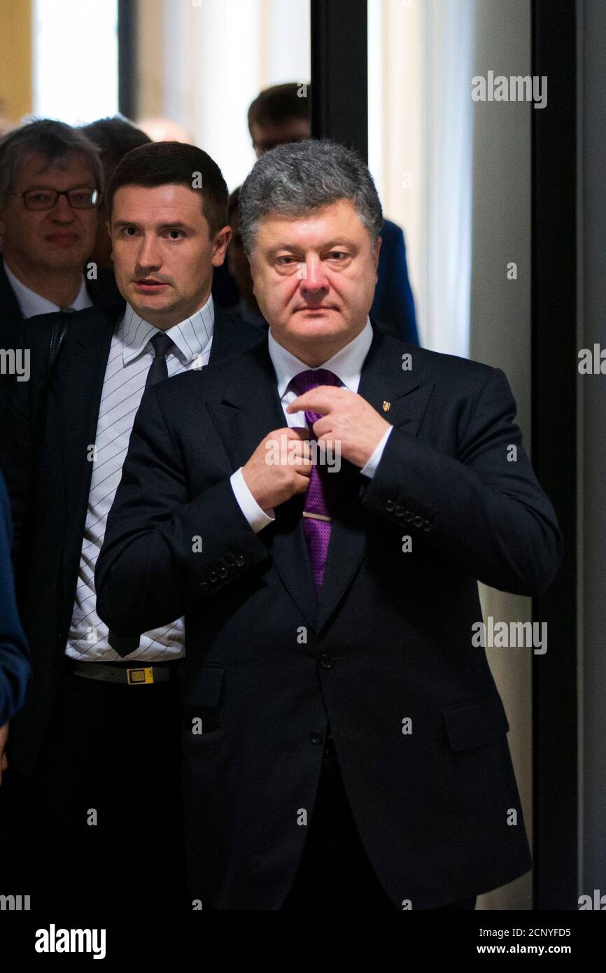 Ukranian presidential candidate Petro Poroschenko arrives to meet the media after talks with Andreas Schockenhoff (not pictured) of Germany's ruling Christian Democratic Union (CDU) in Berlin, May 7, 2014. Poroshenko urged Europe and the United States to agree on a third wave of sanctions against Russia if the Kremlin supports a referendum organised by separatists in eastern Ukraine on May 11.  REUTERS/Thomas Peter (GERMANY - Tags: POLITICS) Stock Photo
