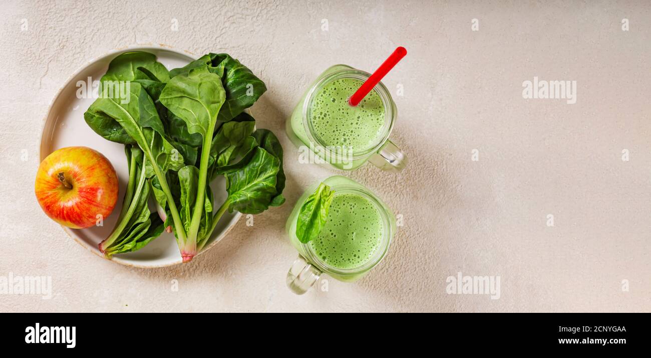 Spinach and yogurt smoothie with apple. Juicy spinach leaves and ripe