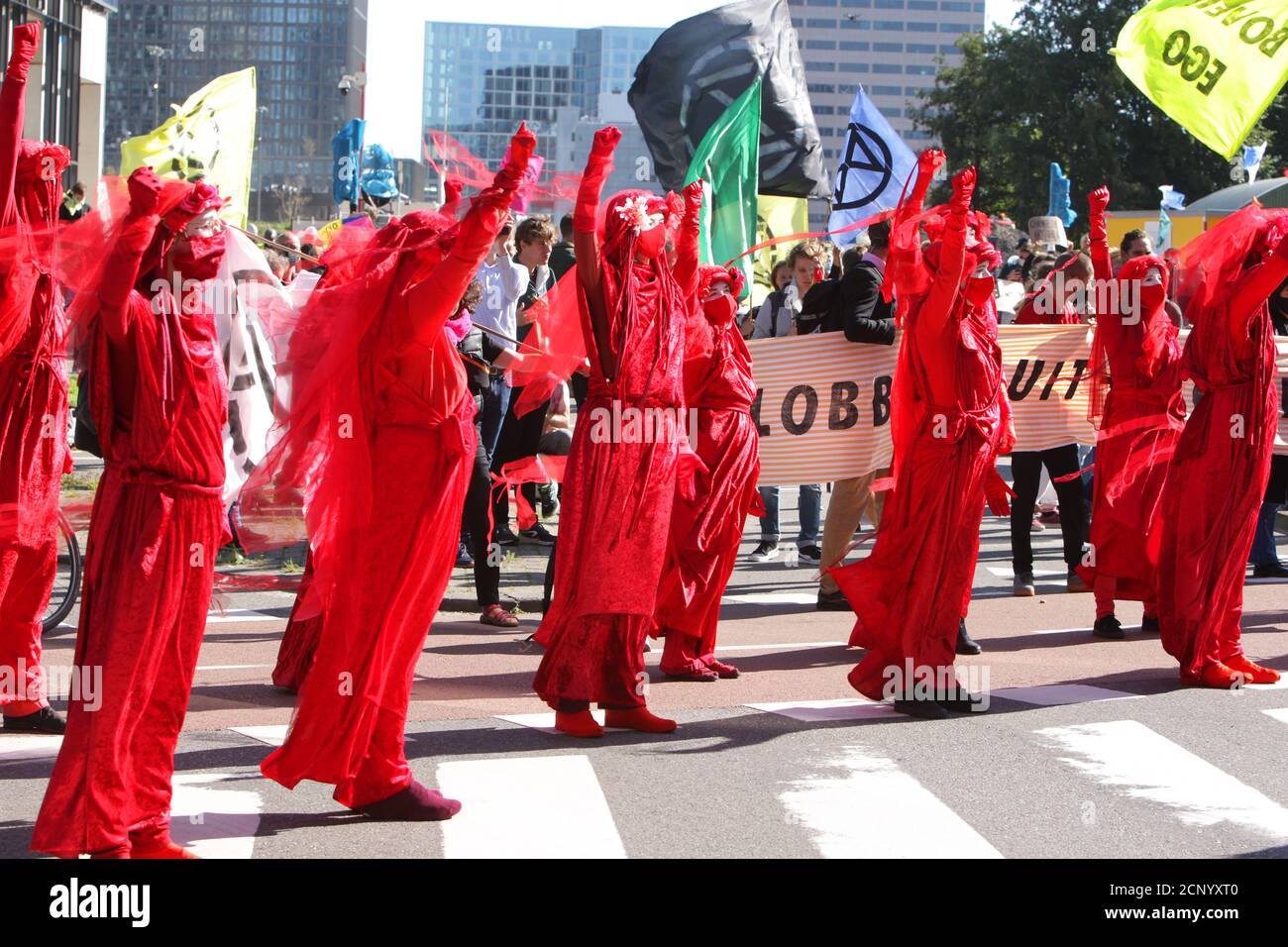 Extinction Rebellions Red Rebell group and activists block the street during protest at the Zuidas financial district amid the Coronavirus pandemic on Stock Photo