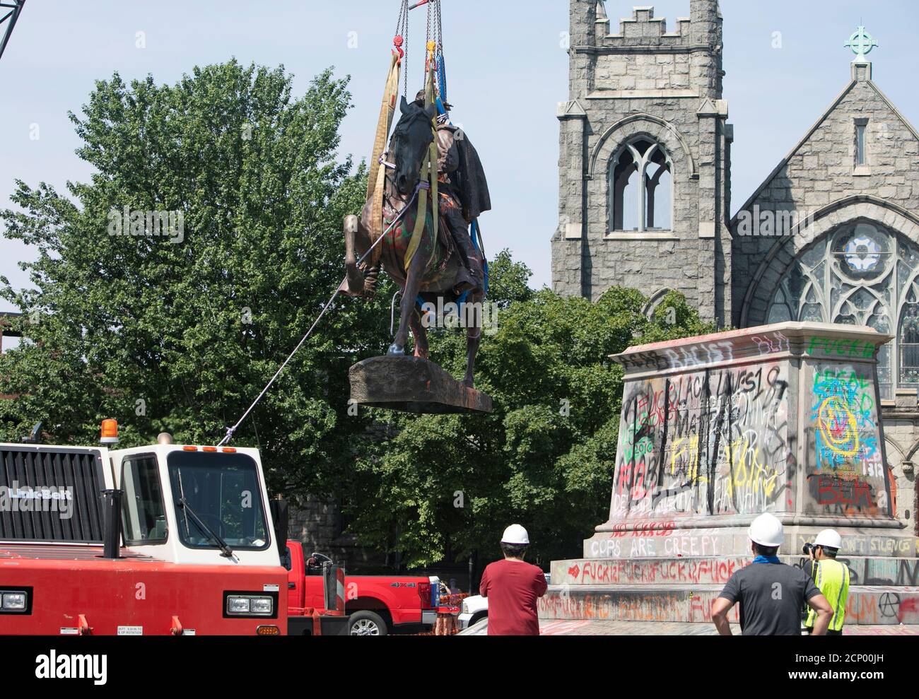 Crews remove the statue to Confederate General J.E.B. Stuart in