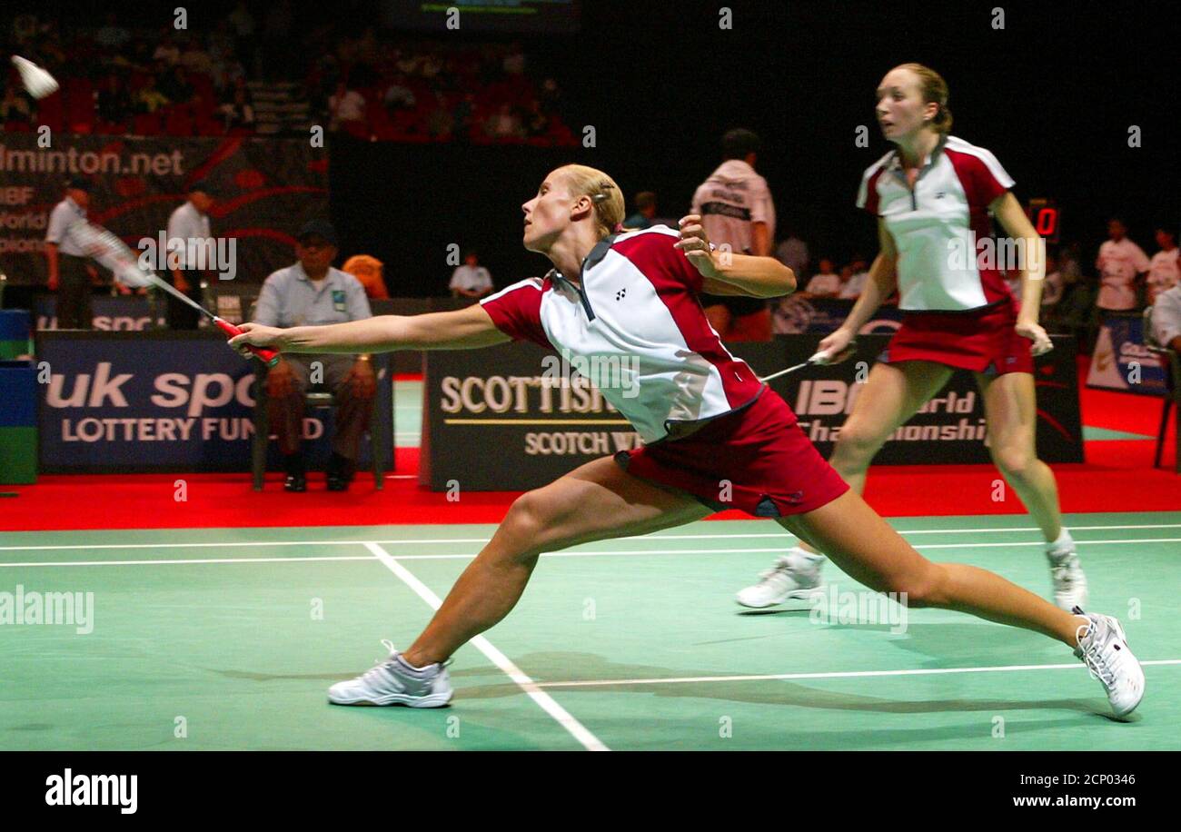 Ella Tripp (L) and Joanne Wright (R) of England return to Chikako Nakayama  and Keiko Yoshitomi of Japan during their third round doubles match at the  World Badminton Championships at Birmingham's National