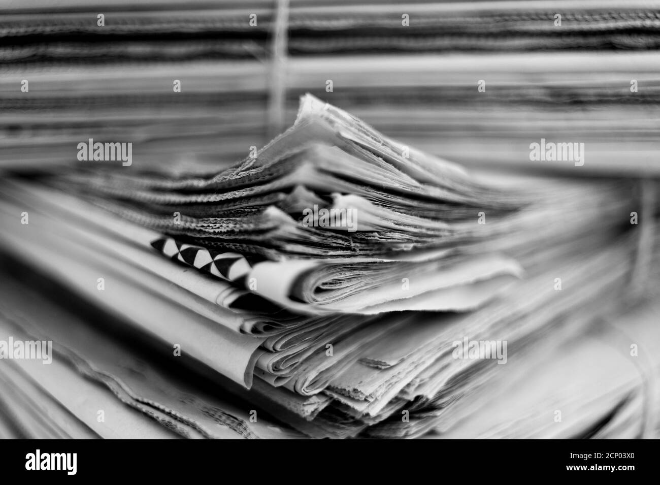 Grayscale shot of a stack of paper Stock Photo - Alamy