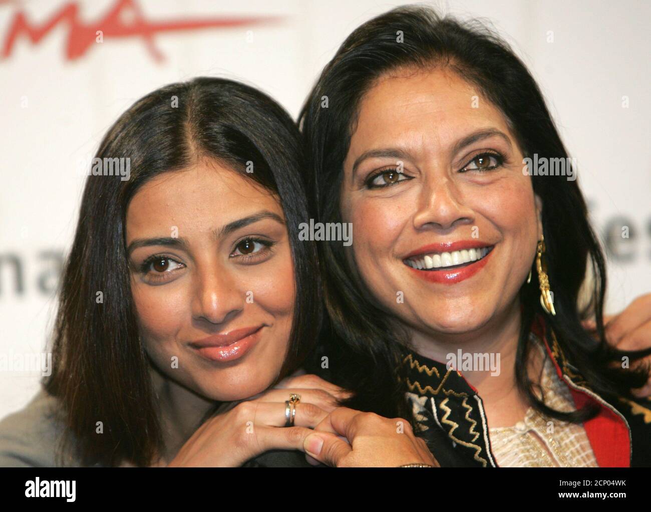 Tabu Film High Resolution Stock Photography And Images Alamy https www alamy com movie director mira nair r and actress tabu pose during a photocall at romes first international film festival october 16 2006 nair is presenting her film the namesake reutersdario pignatelli italy image374944015 html