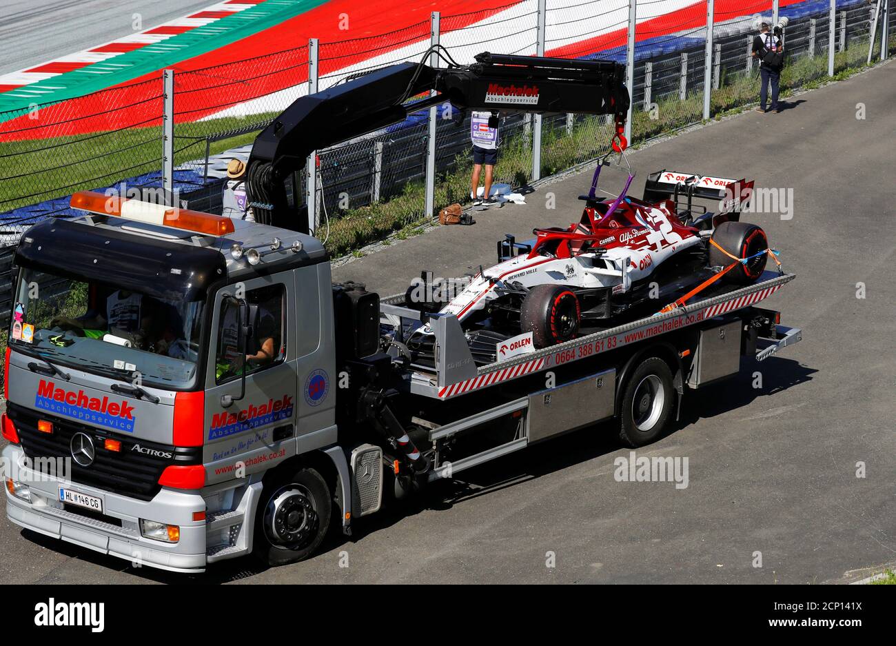 Formula One F1 - Austrian Grand Prix - Red Bull Ring, Spielberg, Styria,  Austria - July 5, 2020 Kimi Raikkonen's Alfa Romeo is removed from the  track, as F1 resumes following the