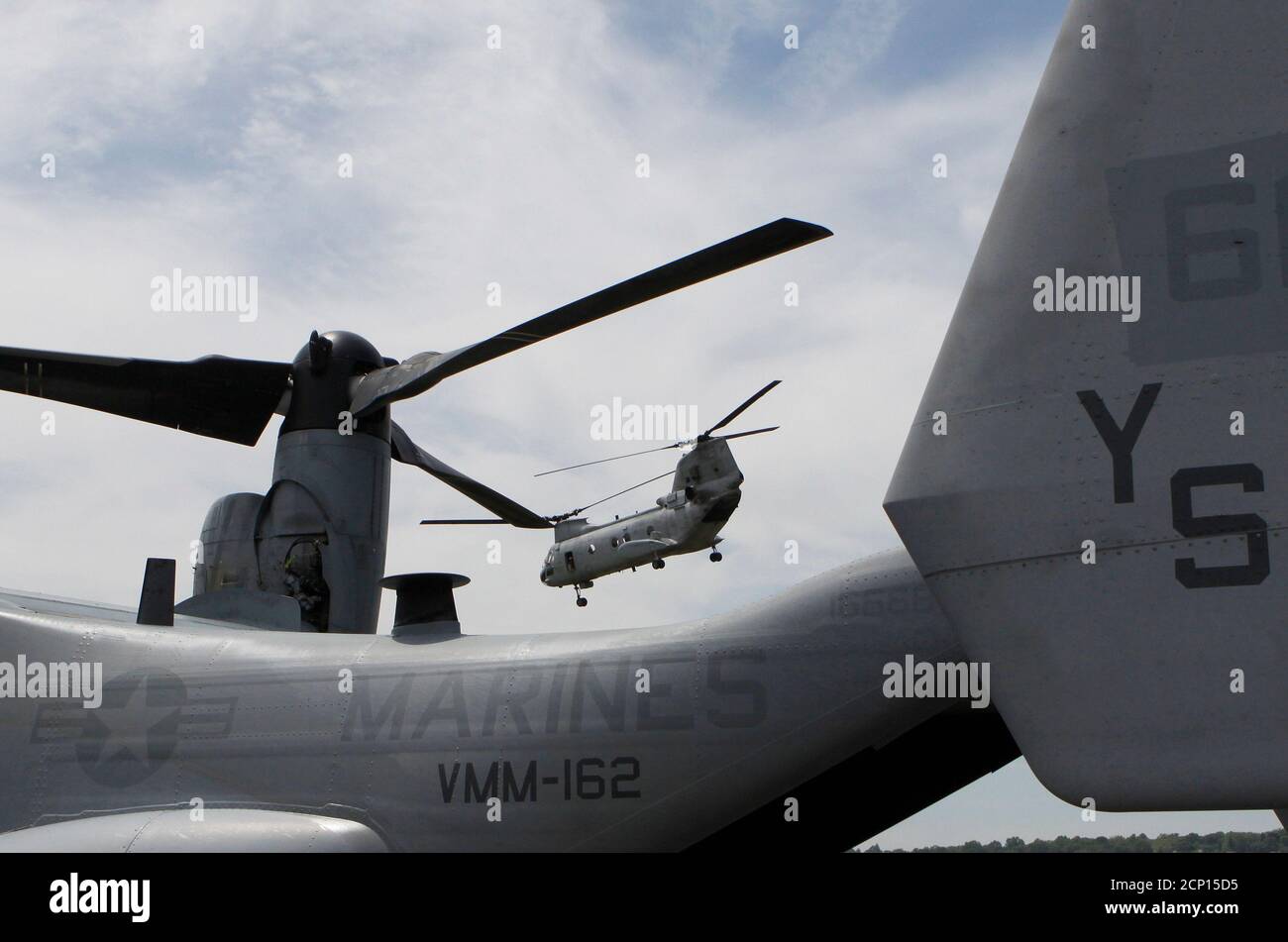 A Boeing CH-46 Sea Knight takes off over an MV-22 Osprey while taking part in a Marine Corps demonstration flight during Fleet Week in New York May 22, 2009.     REUTERS/Brendan McDermid (UNITED STATES MILITARY) Stock Photo