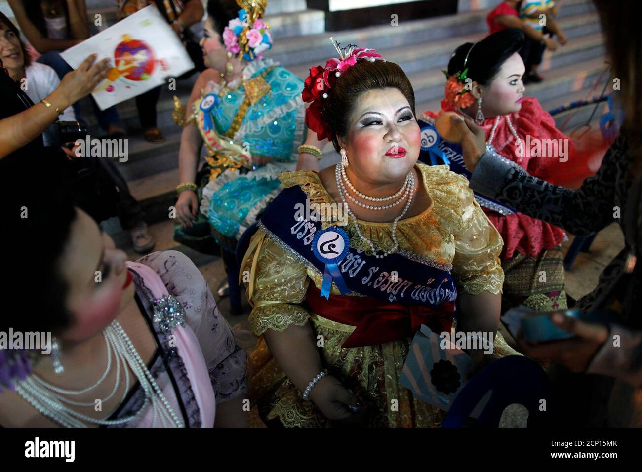 Participants in the Jumbo Queen beauty contest get ready to go onto the stage in Ayutthaya late December 19, 2009. More than 30 Thai ladies took part in the Jumbo Queen beauty contest for women over 80 kg in the world heritage site of Ayutthaya.  REUTERS/Damir Sagolj  (THAILAND - Tags: SOCIETY IMAGES OF THE DAY) Stock Photo