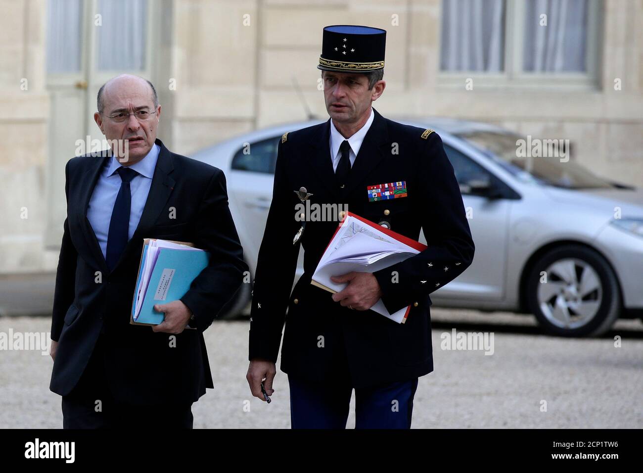 French National Police Director Jean-Marc Falcone (DGPN) (L) and National  Gendarmerie Director General Denis Favier (DGGN) arrive at the Elysee  Palace in Paris, France, November 14, 2015, to attend a Defence  extraordinary