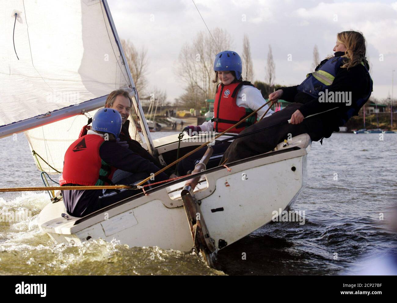 Britain's Prime Minister Blair sails on a Wayfarer dinghy during a visit to  the Upton Warren outdoor education centre. Britain's Prime Minister Tony  Blair (2nd L) sails on a Wayfarer dinghy during