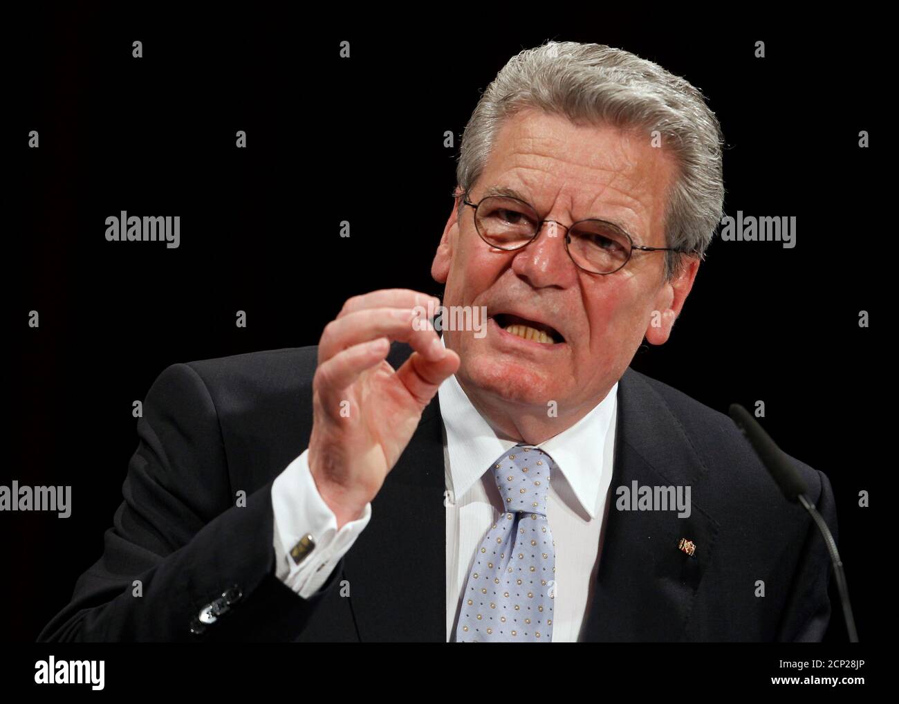 German presidential candidate Joachim Gauck delivers a speech in the Deutsches Theater (German Theatre) in Berlin, June 22, 2010. The vote for the largely ceremonial post is shaping up as a big test for Chancellor Angela Merkel who has been dogged by falling popularity, policy spats in her centre-right coalition and accusations of weak leadership. A failure by Merkel to push through the conservative candidate Christian Wulff, the premier of the state of Lower Saxony, would be widely viewed as a major defeat for her. Joachim Gauck, a former Protestant pastor who played an important role in the  Stock Photo