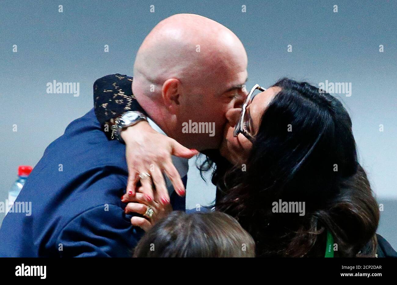 Lina Al Achkar Infantino kisses her husband, newly elected FIFA President  Gianni Infantino during the Extraordinary Congress in Zurich, Switzerland  February 26, 2016. Swiss football executive Gianni Infantino vowed on  Friday to