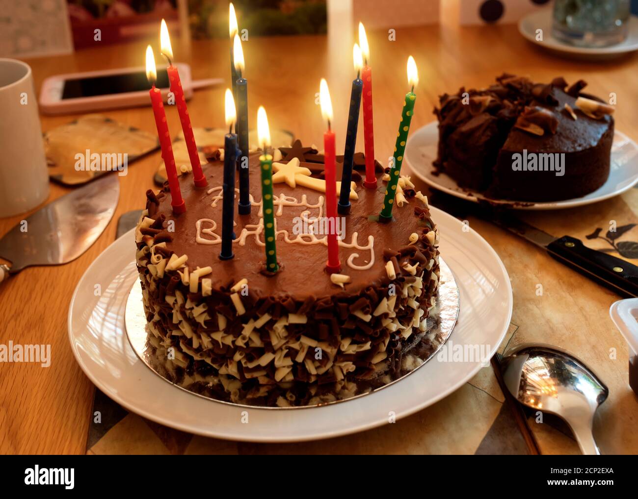 Chocolate birthday cake with candles hires stock photography and