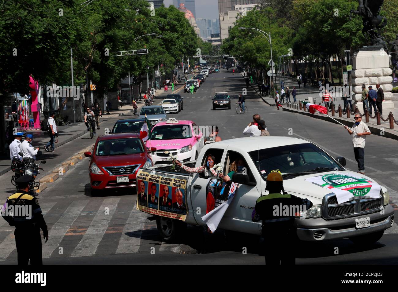 Vehicles take part in a caravan to protest against the Mexican President Andres Manuel Lopez Obrador (ALMO) in Mexico City, Mexico June 14, 2020. REUTERS/Carlos Jasso Stock Photo