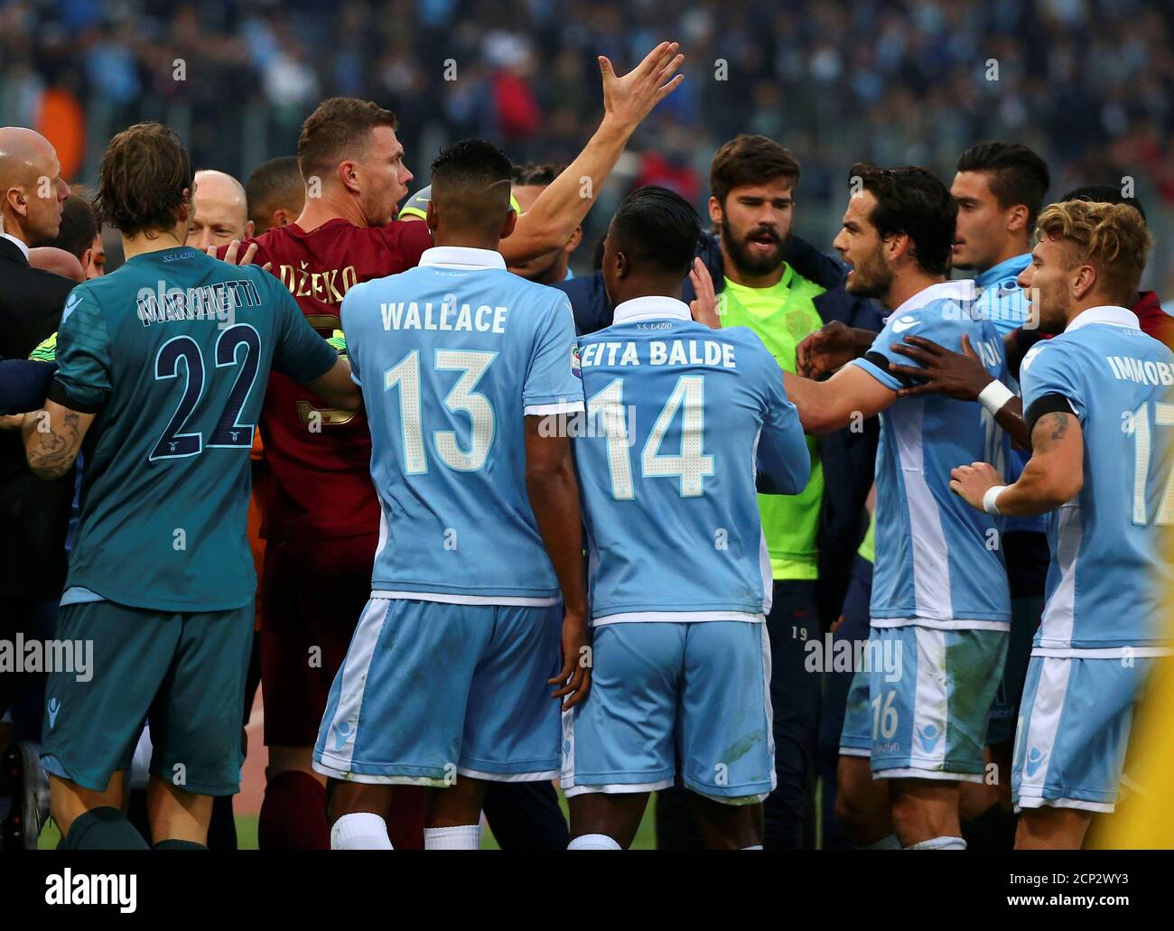 Football - Soccer - Lazio v AS Roma - Italian Serie A - Olympic Stadium, Rome, Italy - 4/12/2016. Lazio's and AS Roma's players argue during the match. REUTERS/Alessandro Bianchi Stock Photo