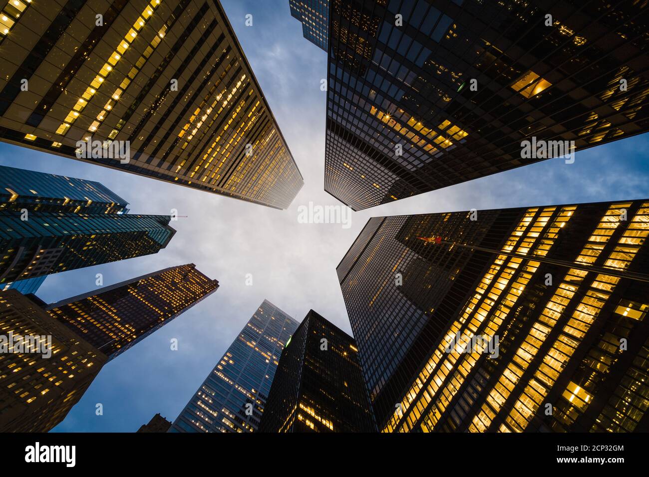 Business and finance concept, looking up at modern office building architecture and high rise corporate buildings in the financial district, Downtown Stock Photo