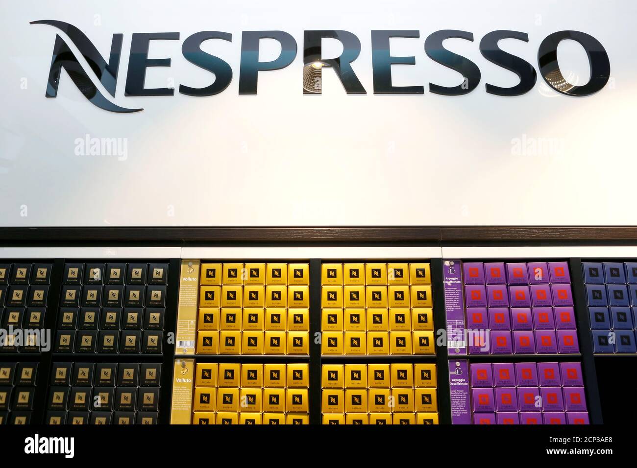 The Nespresso logo and boxes of Nespresso coffee pods are pictured in the  supermarket of Nestle headquarters in Vevey, Switzerland, February 16,  2017. REUTERS/Pierre Albouy Stock Photo - Alamy