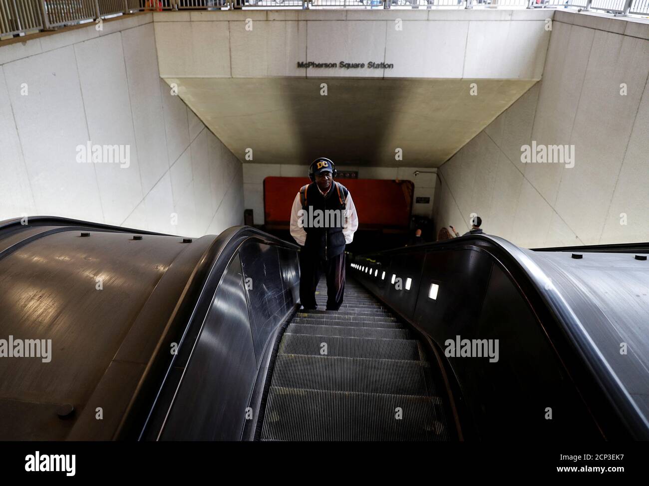 Minutes after 9:00 a.m. on the first workday since the U.S. Government shutdown, a lone Washington commuter rides up the subway escalator at the McPherson Square Metro station near the White House in downtown Washington, U.S. January 22, 2018.   REUTERS/Jim Bourg Stock Photo