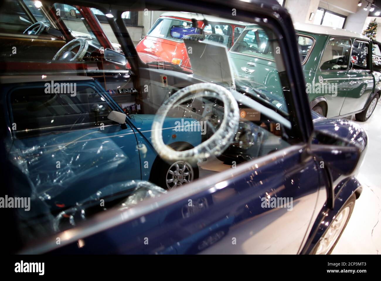 Rover Mini Cooper, Rover Mini Mayfair and Rover Mini Paul Smith cars are  displayed at the