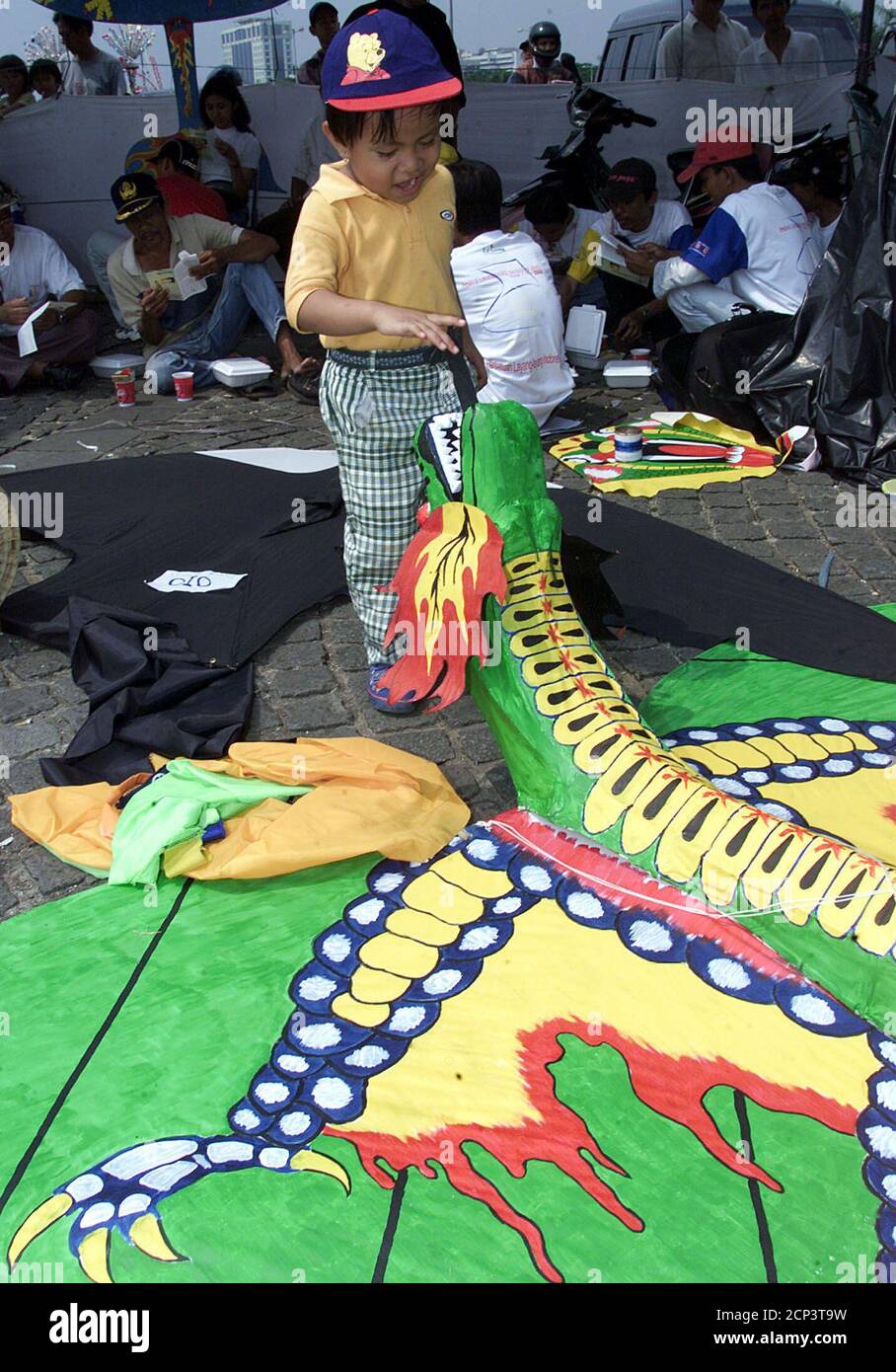 An Indonesian child touches the mouth of a dragon kite from Taiwan at the International Kite Festival in Jakarta on July 9. Participants from fourteen provinces in Indonesia and ten countries including Taiwan, Brunei, Malaysia, Singapore, Netherland and Japan, joined the three-day festival. BEA/CC Stock Photo
