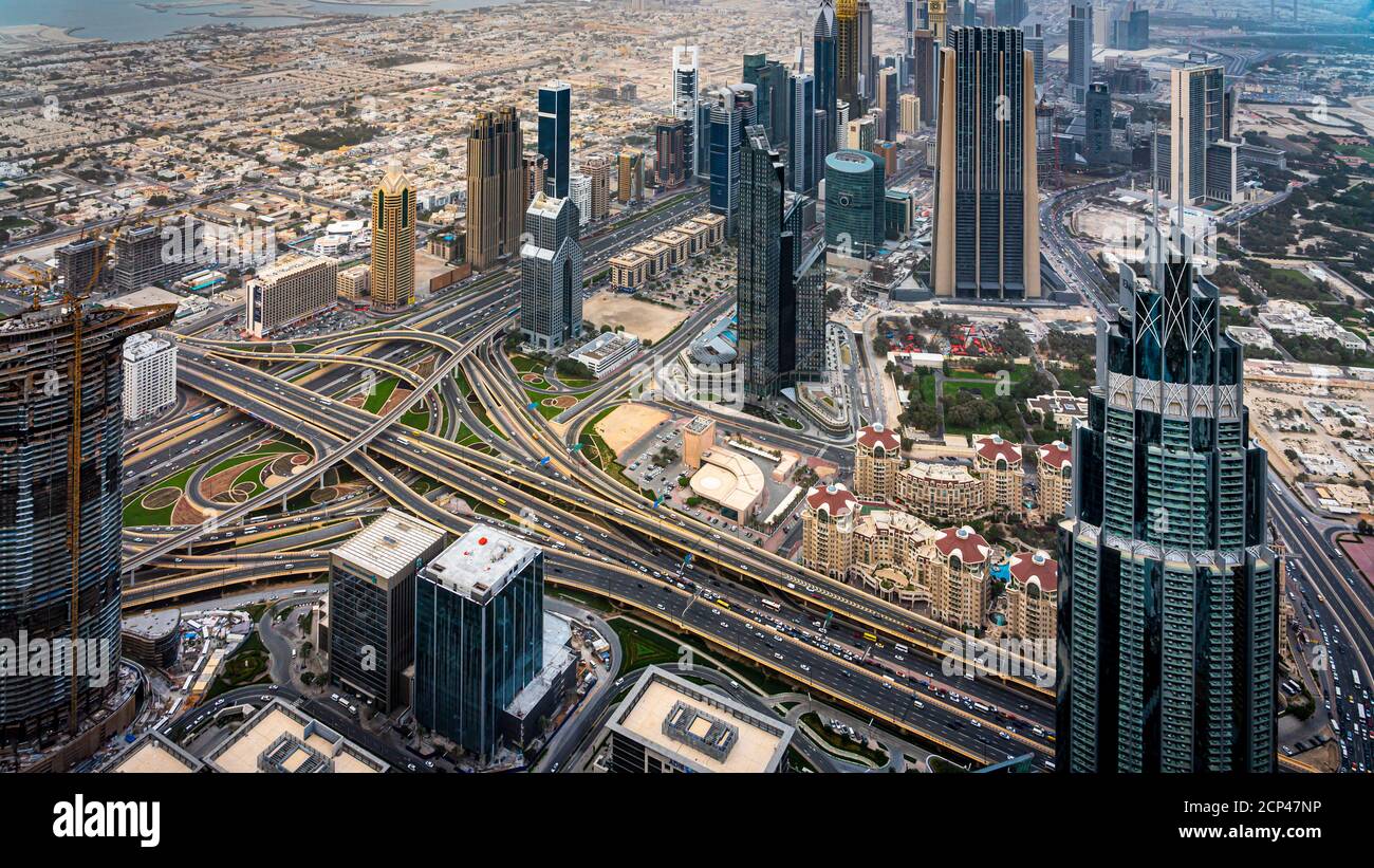 Sunset and the city skyline from Burj Khalifa in Dubai, UAE, Middle East. Stock Photo