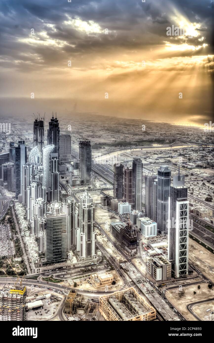Sunset and the city skyline from Burj Khalifa in Dubai, UAE, Middle East. Stock Photo