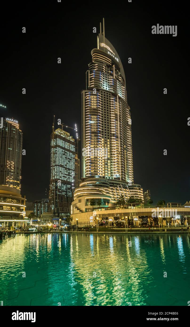 The Lake Hotel illuminated at night in Dubai, UAE, Middle East. Stock Photo